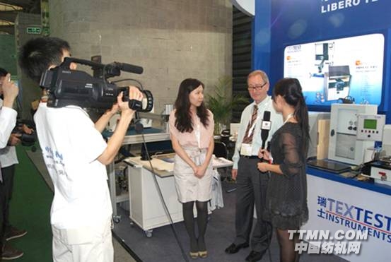 G:\2011上海紡機展圖片整理\紡機網(wǎng)文章\現(xiàn)場采訪剪影\File0322.jpg